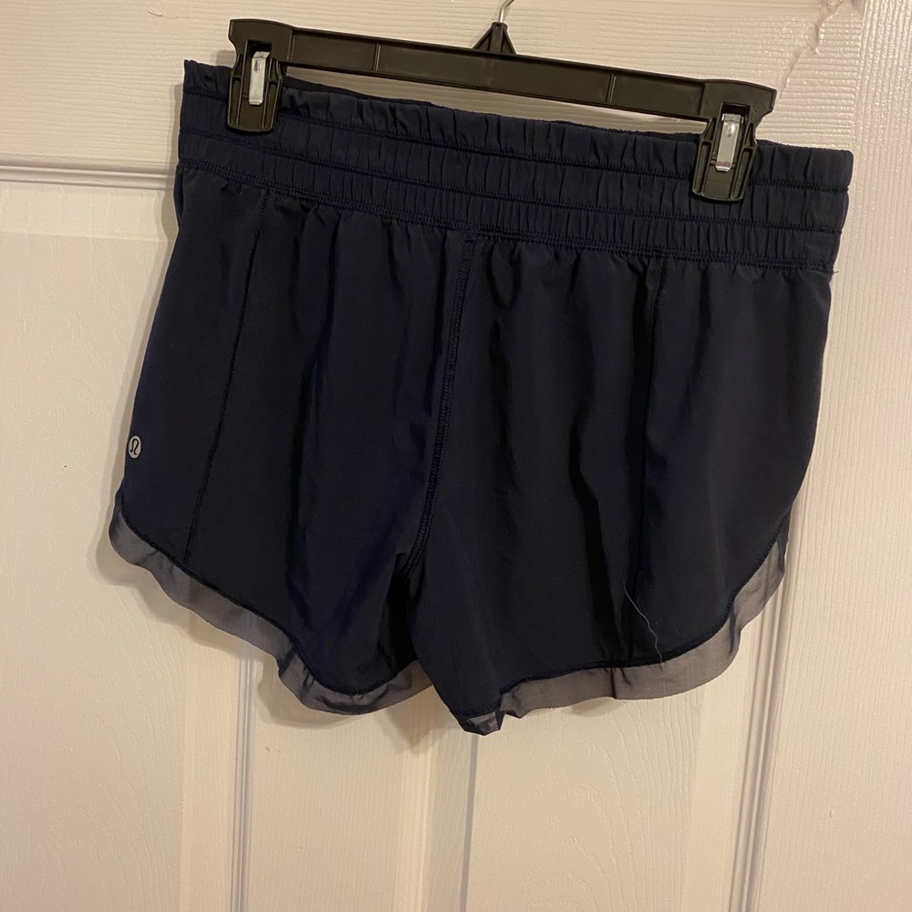 Lululemon shorts, raw mesh hem. No liner. Size 6